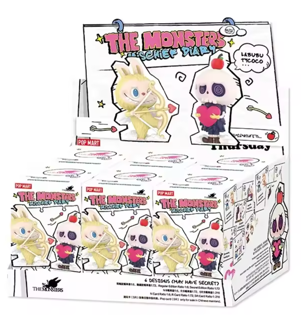 Display box of 'The Monster's Diary' toy figures with cartoonish designs.